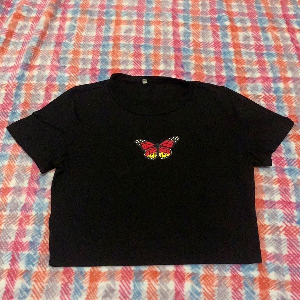 selling a butterfly crop top.